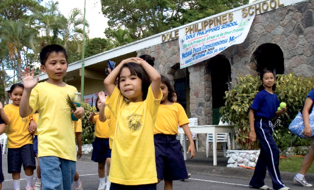 A Dole school in the Philippines. In many production areas, Dole provides programs and facilities in support of the communities’ medical, educational, recreational and housing needs.