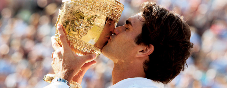 Roger Federer with the Wimbledon trophy