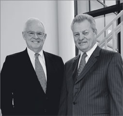  John J. Schiff, Jr., CPCU chairman of the board, with Kenneth W. Stecher, president and chief executive officer.