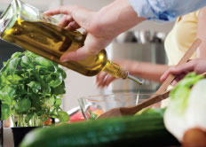 Adding oil to mixing bowl