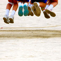 Children's feet hanging in midair
