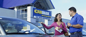 CarMax Superstore CarMax shoppers in front of superstore